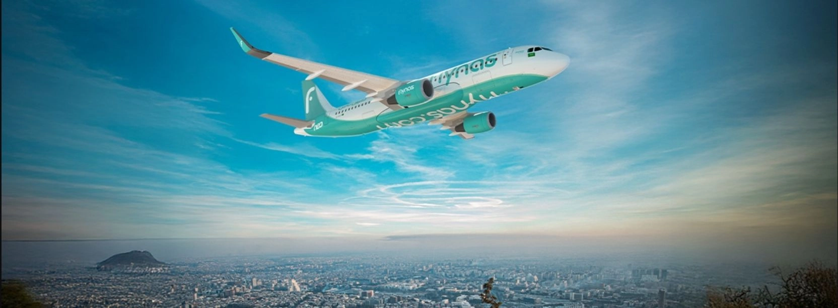 Repülőgép híres város fölött repül