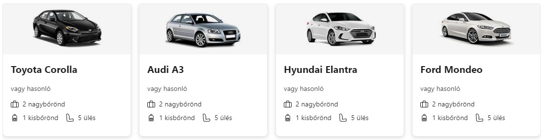 egy fekete autó, két szürke és két fehér